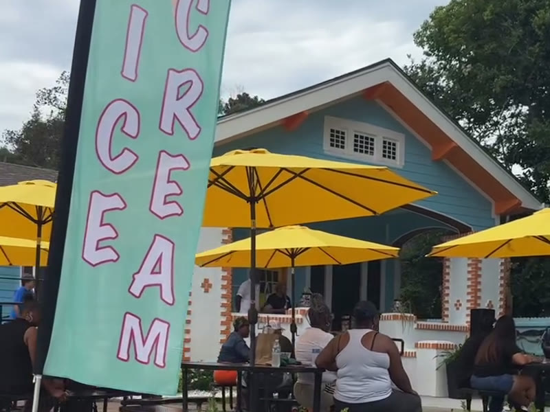 Tootsie on the River ice cream shop with yellow umbrellas